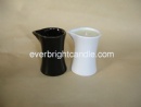 Massage Candle With Black and White Ceratimic Vessel